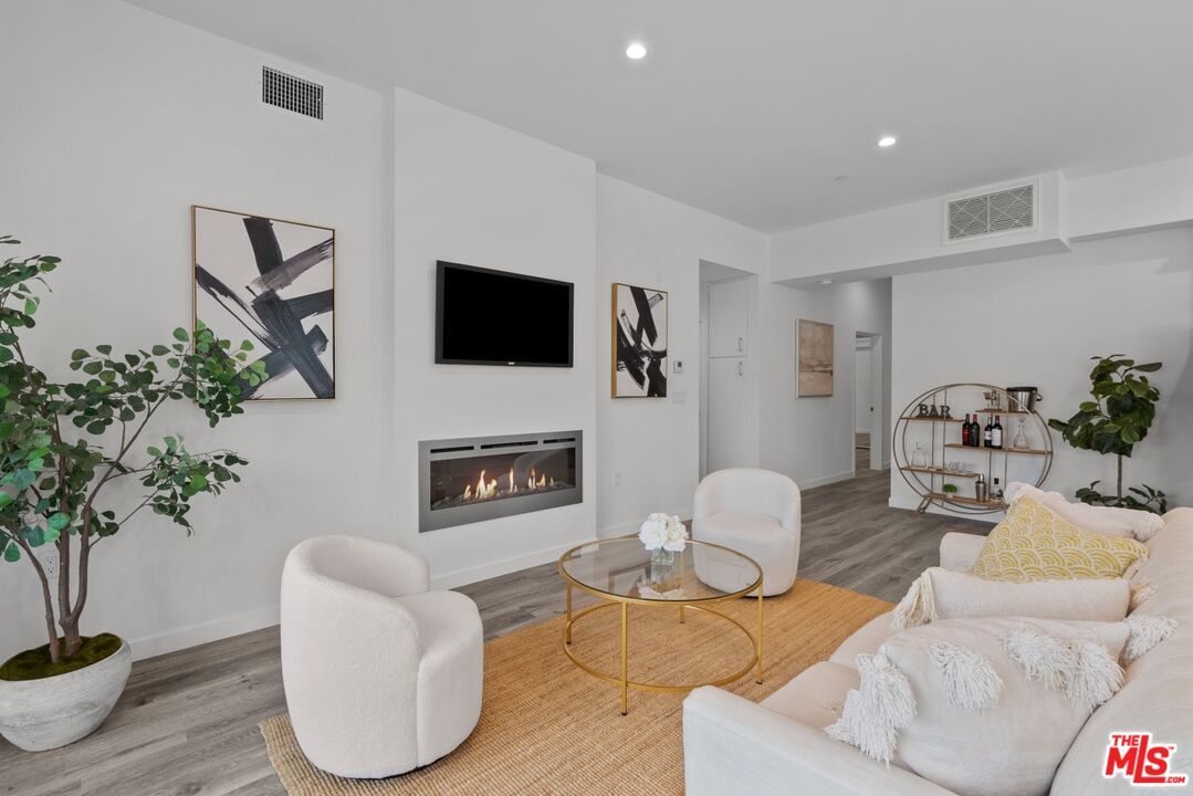 Fireplace, Interior, Living room, Recessed Lighting, Wood Texture Flooring