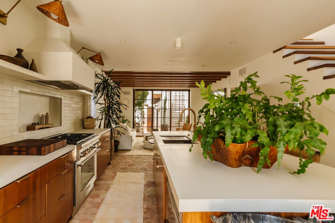 Interior, Kitchen, Recessed Lighting, Stainless Steel Appliances, Stone Walls