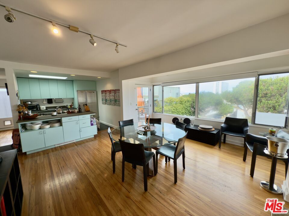 Dining room, Interior, Kitchen, Living room, Recessed Lighting, Stainless Steel Appliances, Wood Texture Flooring