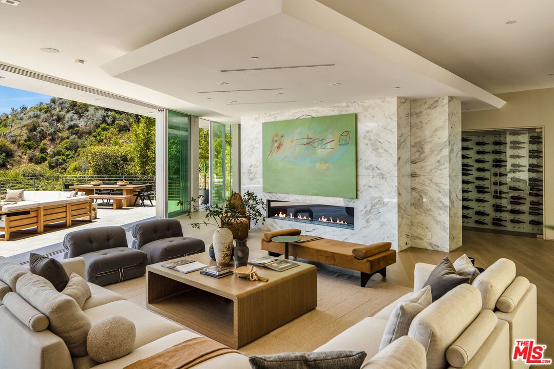 Fireplace, Interior, Living room, Marble Walls, Recessed Lighting, Wood Texture Flooring