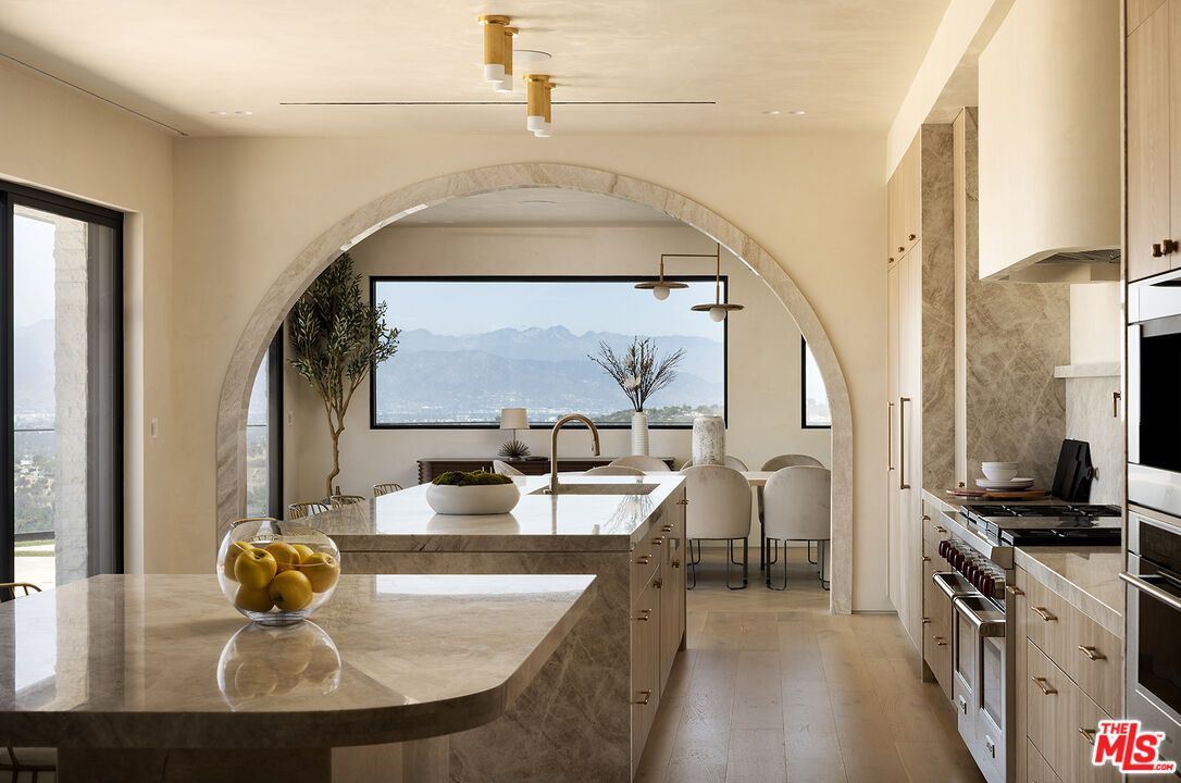 Dining room, Interior, Kitchen, Recessed Lighting, Stainless Steel Appliances, Wood Texture Flooring