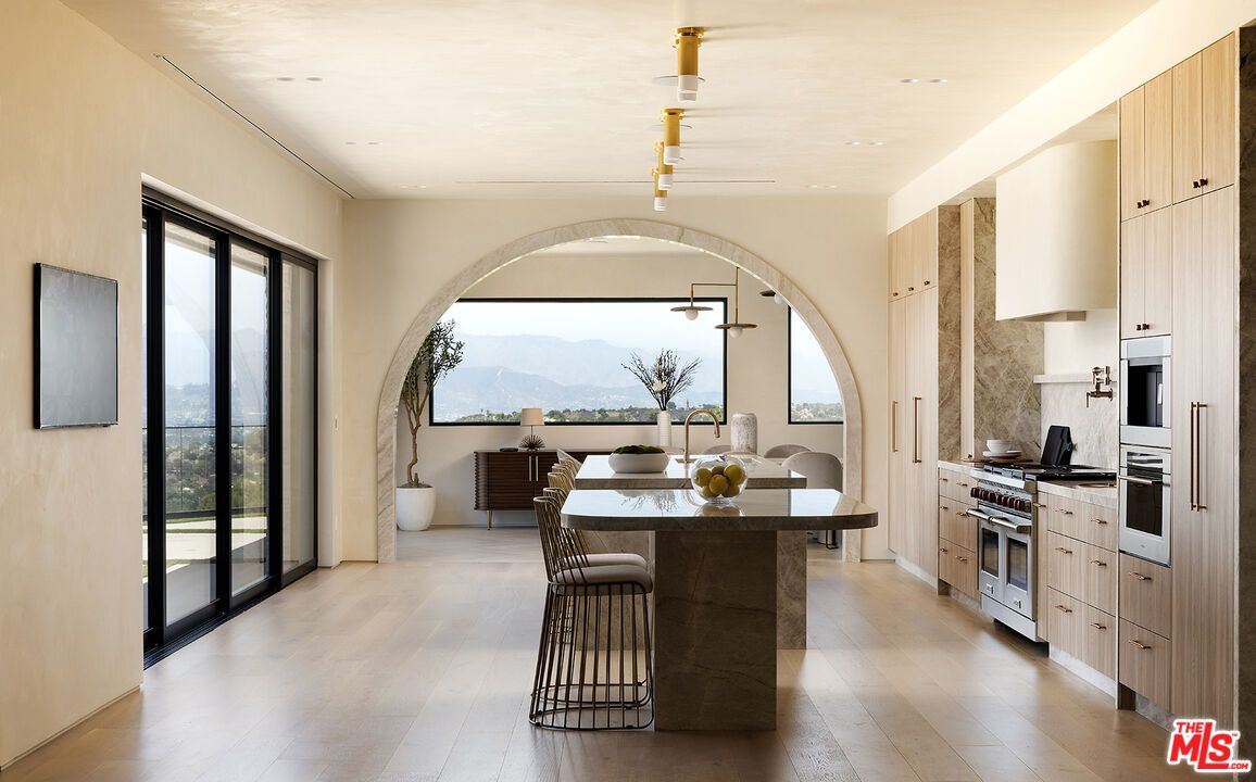 Dining room, Interior, Kitchen, Recessed Lighting, Stainless Steel Appliances, Wood Texture Flooring