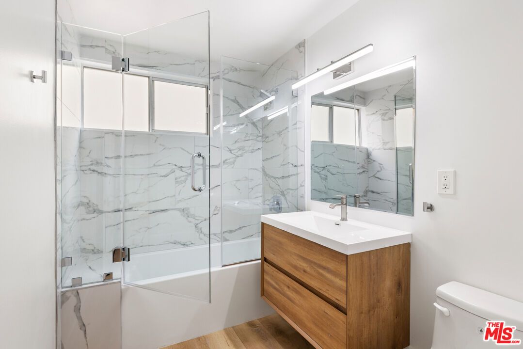 Bathroom, Glass Shower, Interior, Marble Walls, Wood Texture Flooring