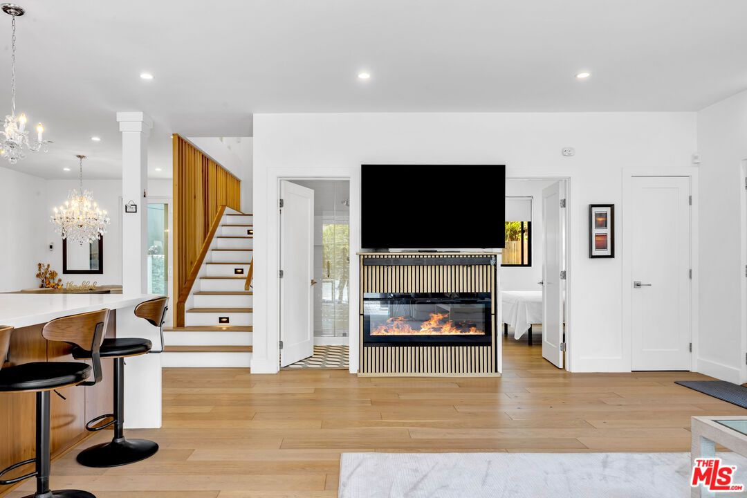 Chandelier, Fireplace, Interior, Pendant Lights, Recessed Lighting, Wood Texture Flooring