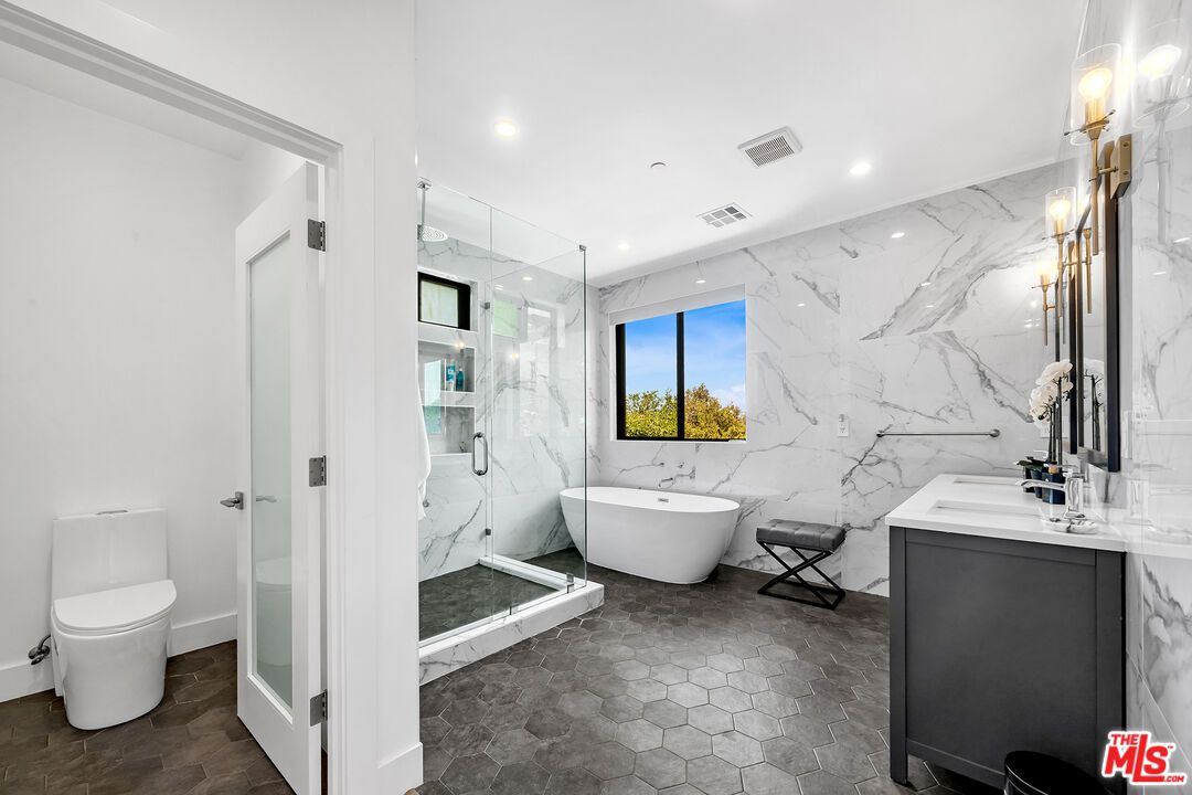 Bathroom, Free Standing Baths, Glass Shower, Interior, Marble Walls, Recessed Lighting