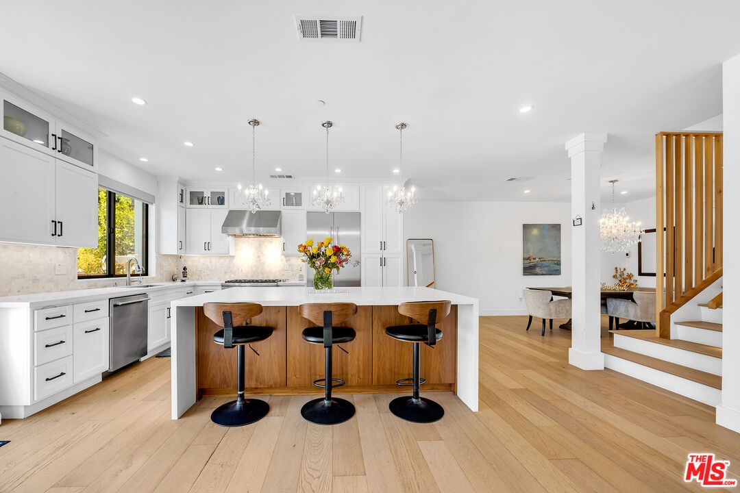 Dining room, Interior, Kitchen, Pendant Lights, Recessed Lighting, Stainless Steel Appliances, Wood Texture Flooring