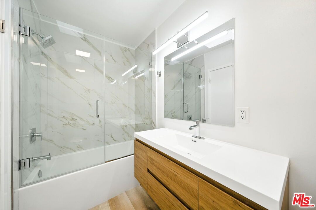 Bathroom, Glass Shower, Interior, Marble Walls, Wood Texture Flooring