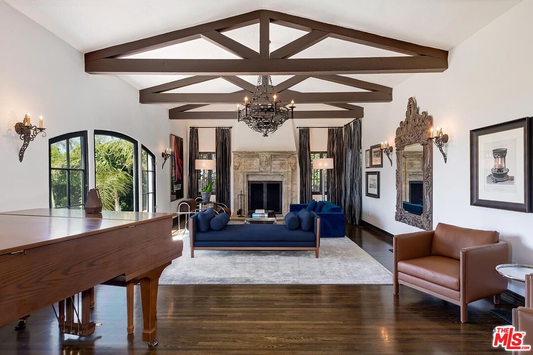 Chandelier, Fireplace, Interior, Living room, Piano, Wooden Beams, Wood Texture Flooring
