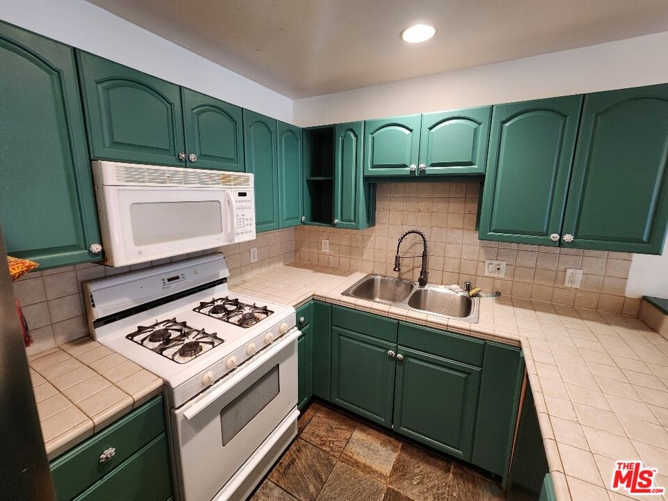 Interior, Kitchen, Recessed Lighting, Tile Countertops