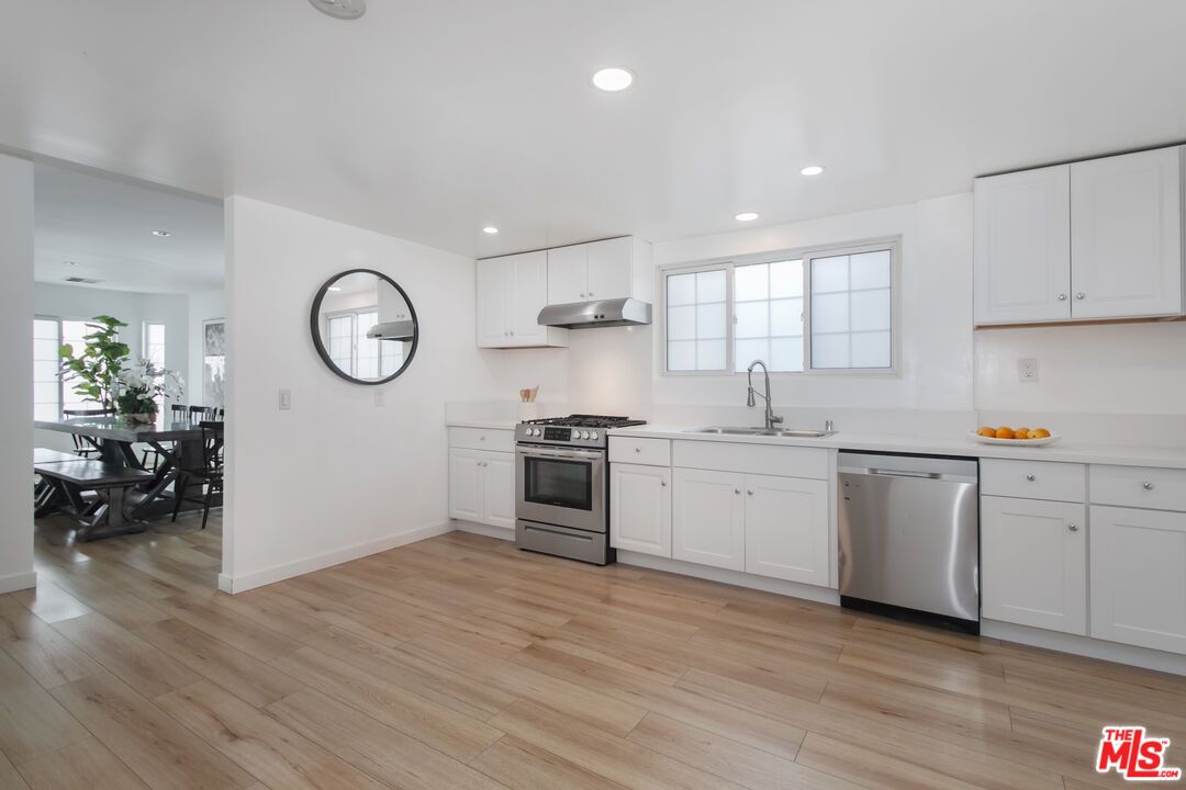 Dining room, Interior, Kitchen, Recessed Lighting, Stainless Steel Appliances, Wood Texture Flooring