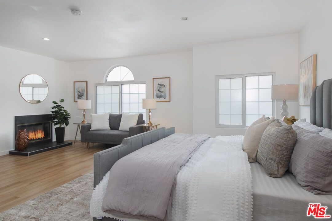 Bedroom, Fireplace, Interior, Recessed Lighting, Wood Texture Flooring