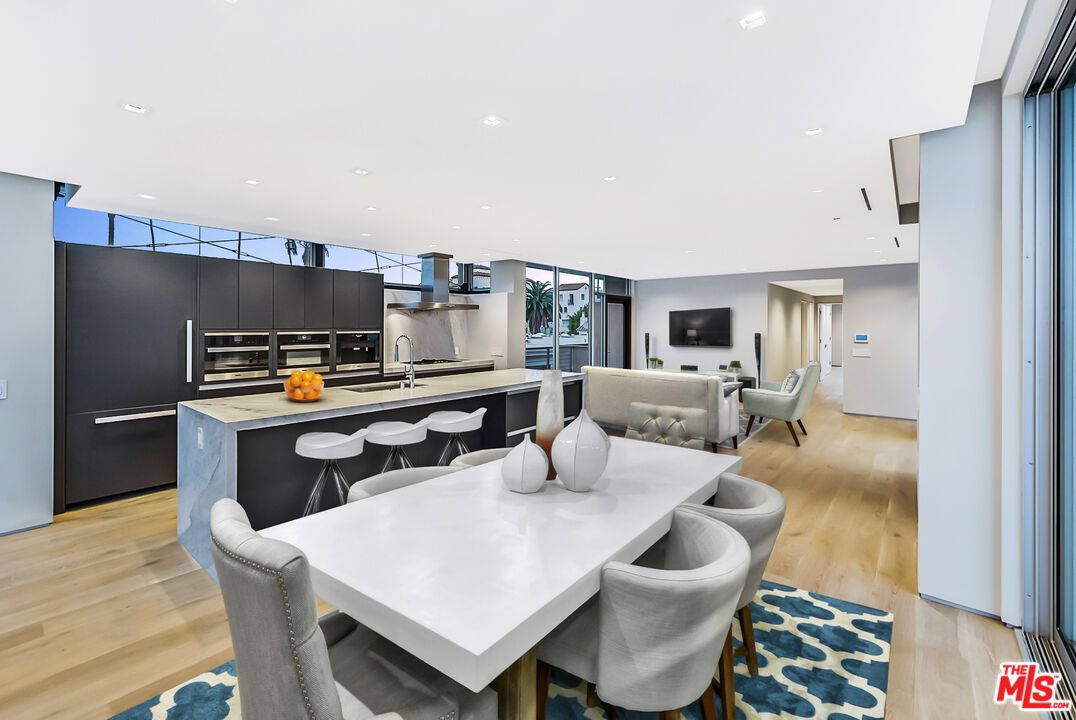 Dining room, Interior, Kitchen, Living room, Recessed Lighting, Stainless Steel Appliances, Wood Texture Flooring