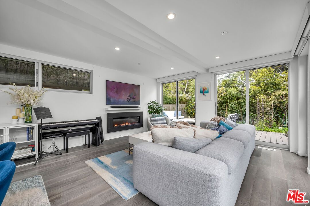 Fireplace, Interior, Living room, Recessed Lighting, Wood Texture Flooring