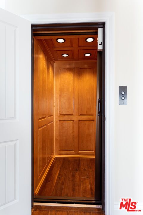 Elevator, Interior, Recessed Lighting, Wooden Ceilings, Wood Texture Flooring, Wooden Walls