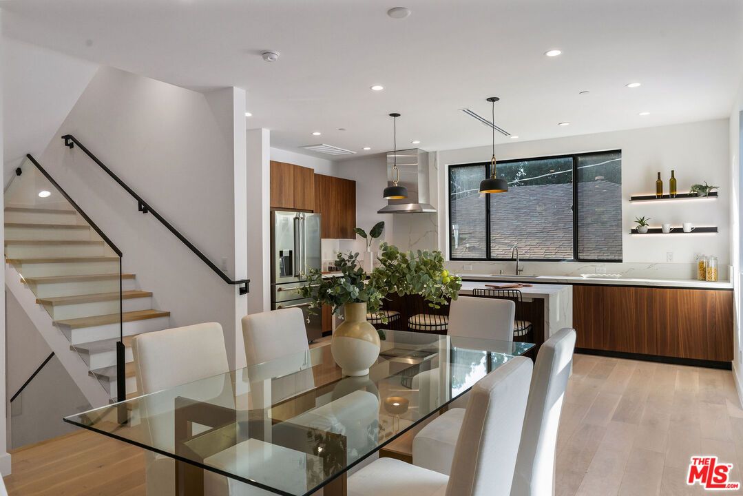 Dining room, Interior, Kitchen, Pendant Lights, Recessed Lighting, Stainless Steel Appliances, Wood Texture Flooring