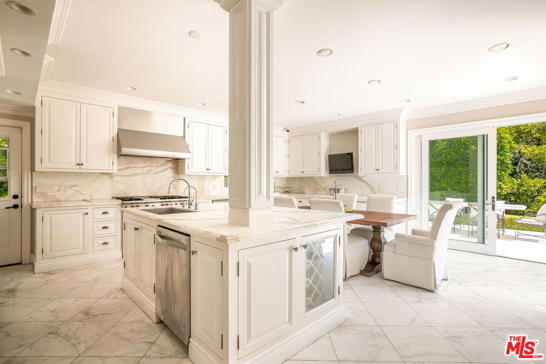 Dining room, Interior, Kitchen, Marble, Marble Walls, Recessed Lighting, Stainless Steel Appliances