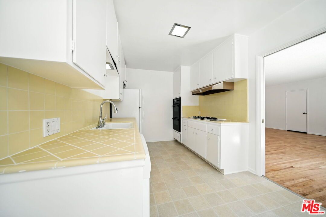 Interior, Kitchen, Tile Countertops, Wood Texture Flooring