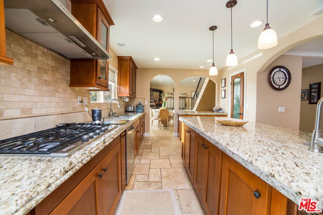 Interior, Kitchen, Pendant Lights, Recessed Lighting, Stainless Steel Appliances, Stone Walls
