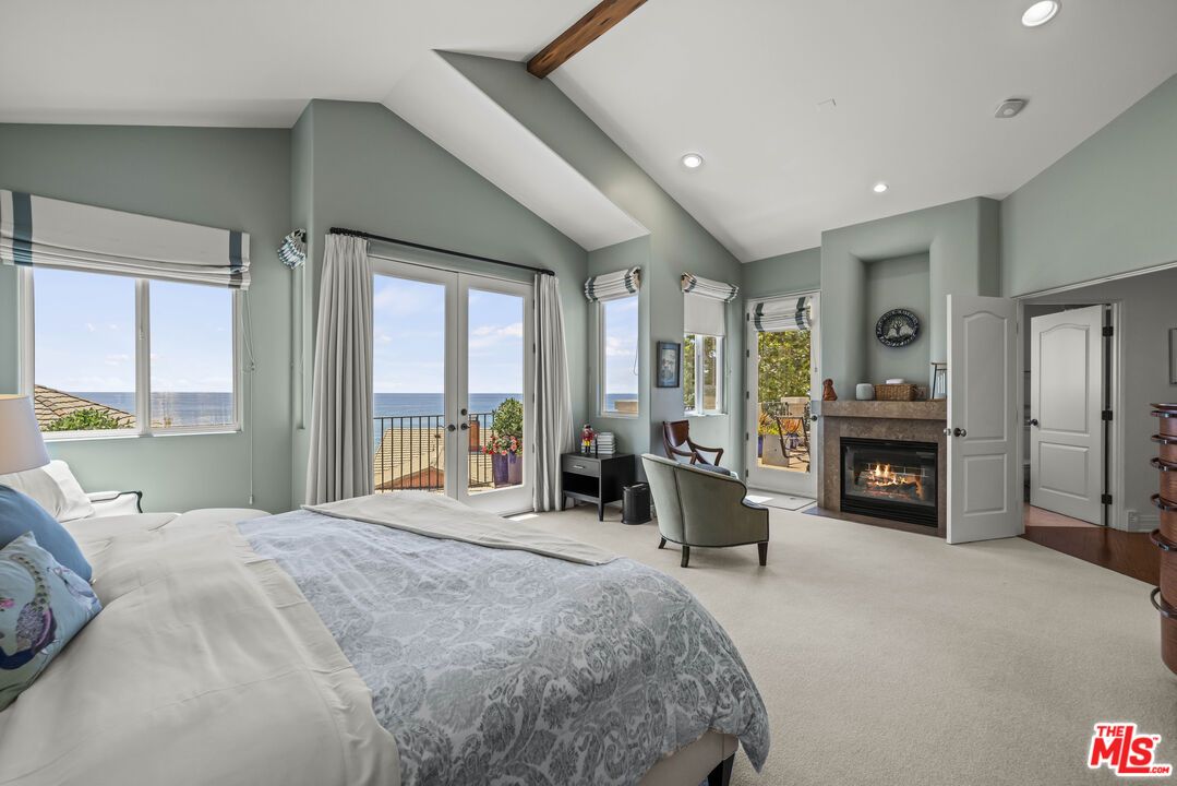 Bedroom, Fireplace, Interior, Recessed Lighting, Water, Wooden Beams
