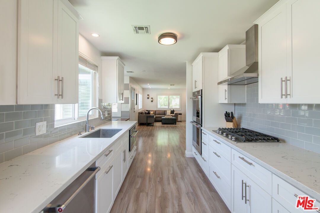 Interior, Kitchen, Living room, Recessed Lighting, Stainless Steel Appliances, Wood Texture Flooring