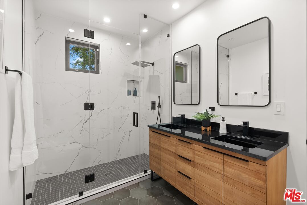 Bathroom, Dual Sink Vanities, Glass Shower, Interior, Marble Walls, Recessed Lighting