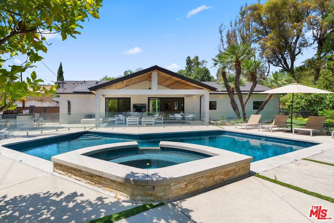 Exterior, Pool, Solar Panels