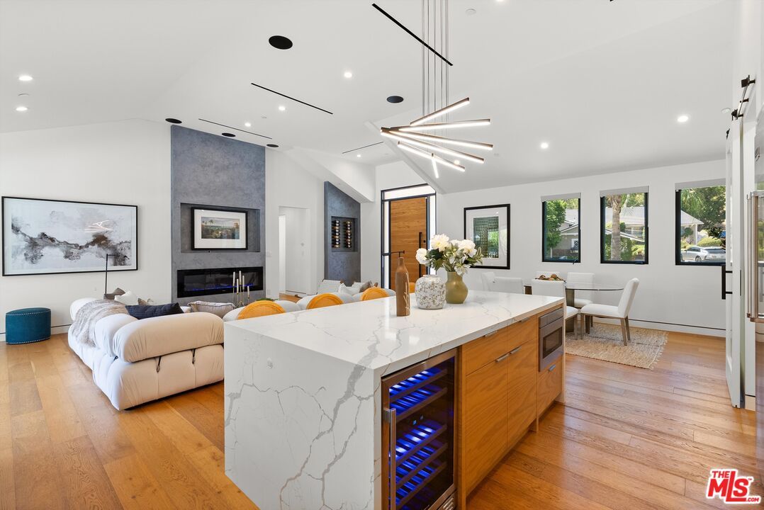 Dining room, Fireplace, Interior, Kitchen, Pendant Lights, Recessed Lighting, Wood Texture Flooring