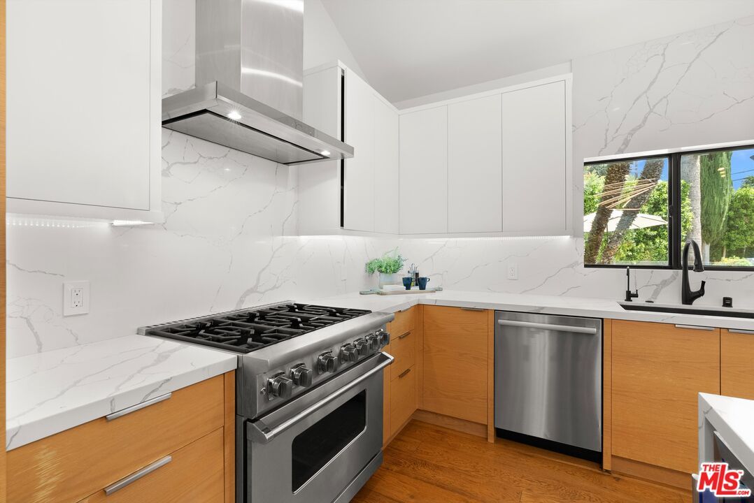 Interior, Kitchen, Marble Walls, Stainless Steel Appliances, Wood Texture Flooring