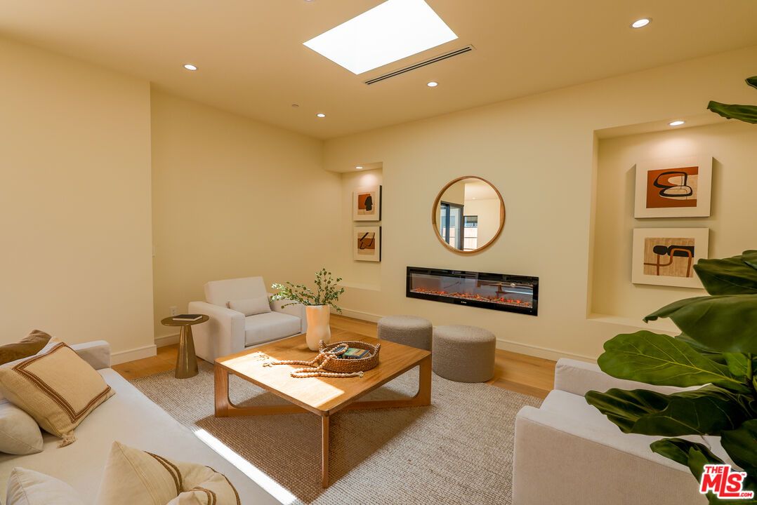 Fireplace, Interior, Living room, Recessed Lighting, Wood Texture Flooring