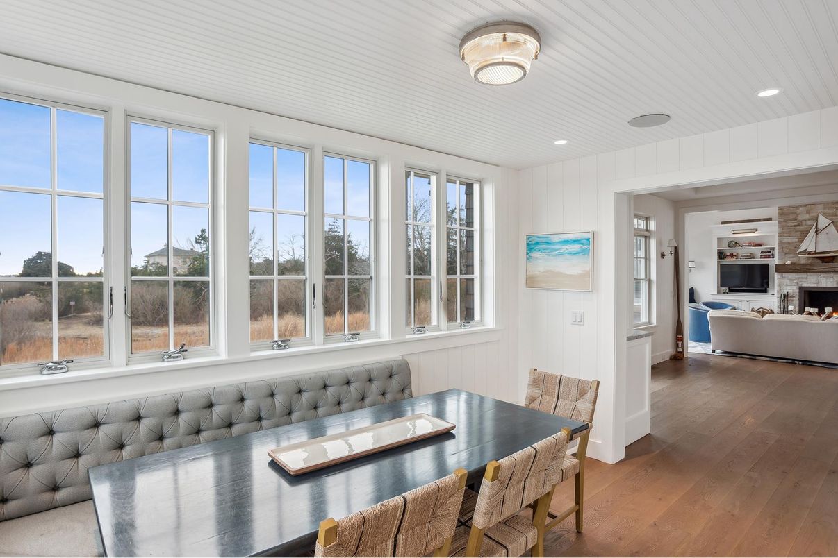 Dining room, Fireplace, Interior, Living room, Recessed Lighting, Wood Texture Flooring