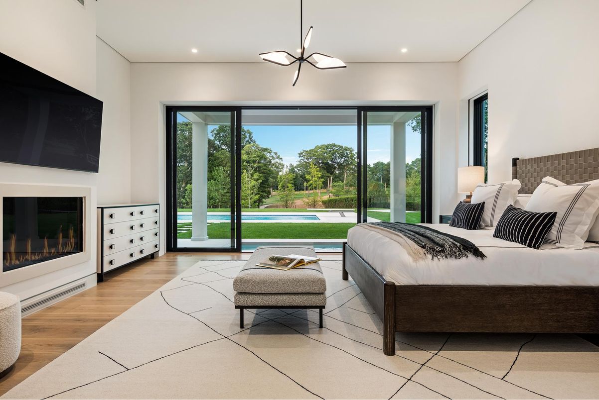 Bedroom, Fireplace, Interior, Pendant Lights, Recessed Lighting, Wood Texture Flooring