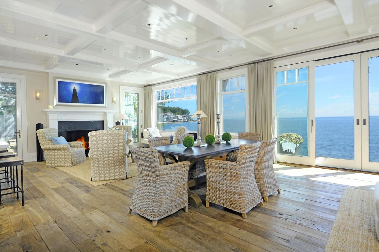 Dining room, Fireplace, Interior, Living room, Recessed Lighting, Water, Wood Texture Flooring