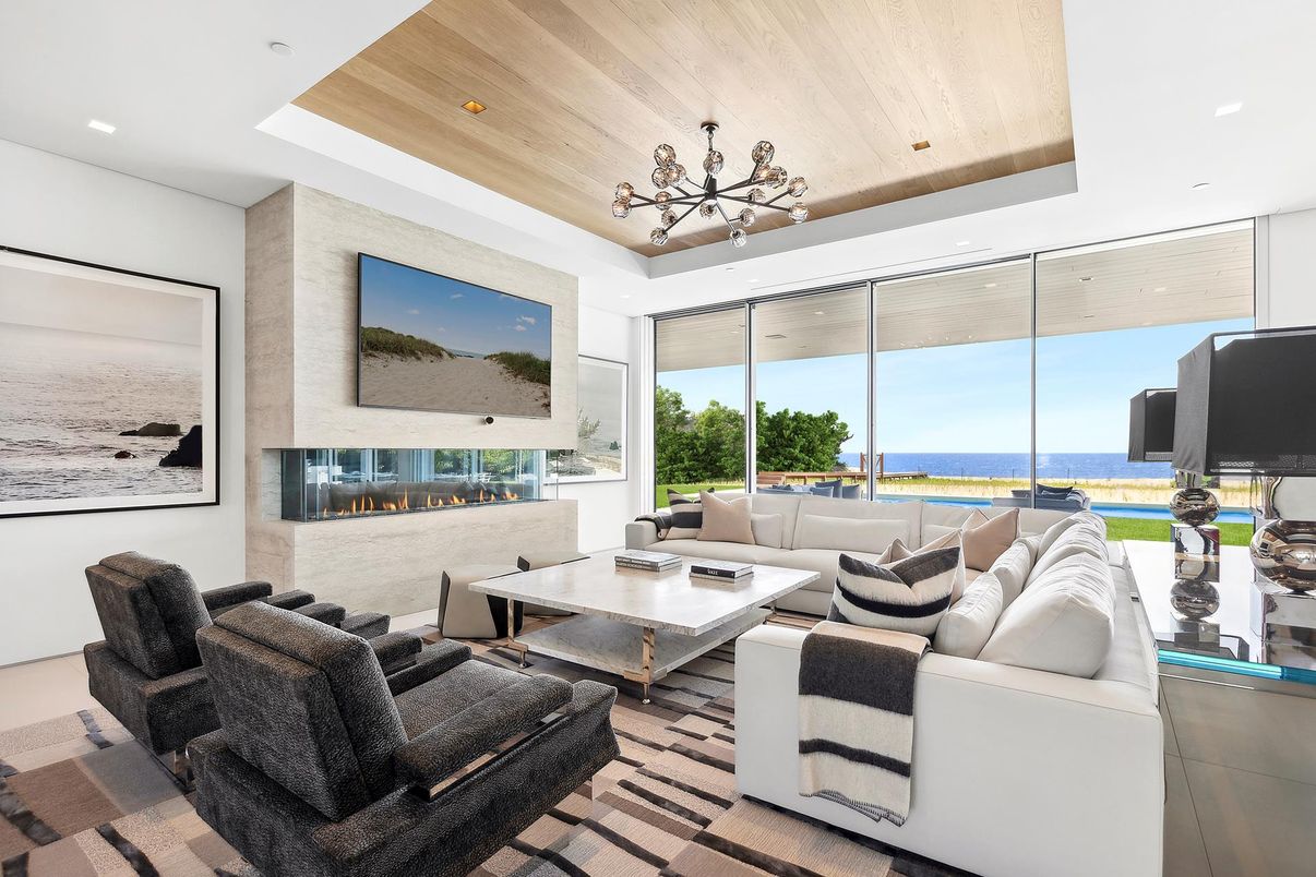 Fireplace, Interior, Living room, Recessed Lighting, Water, Wooden Ceilings