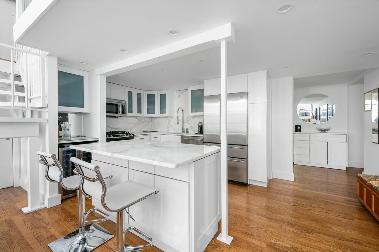 Interior, Kitchen, Marble Walls, Recessed Lighting, Stainless Steel Appliances, Wood Texture Flooring