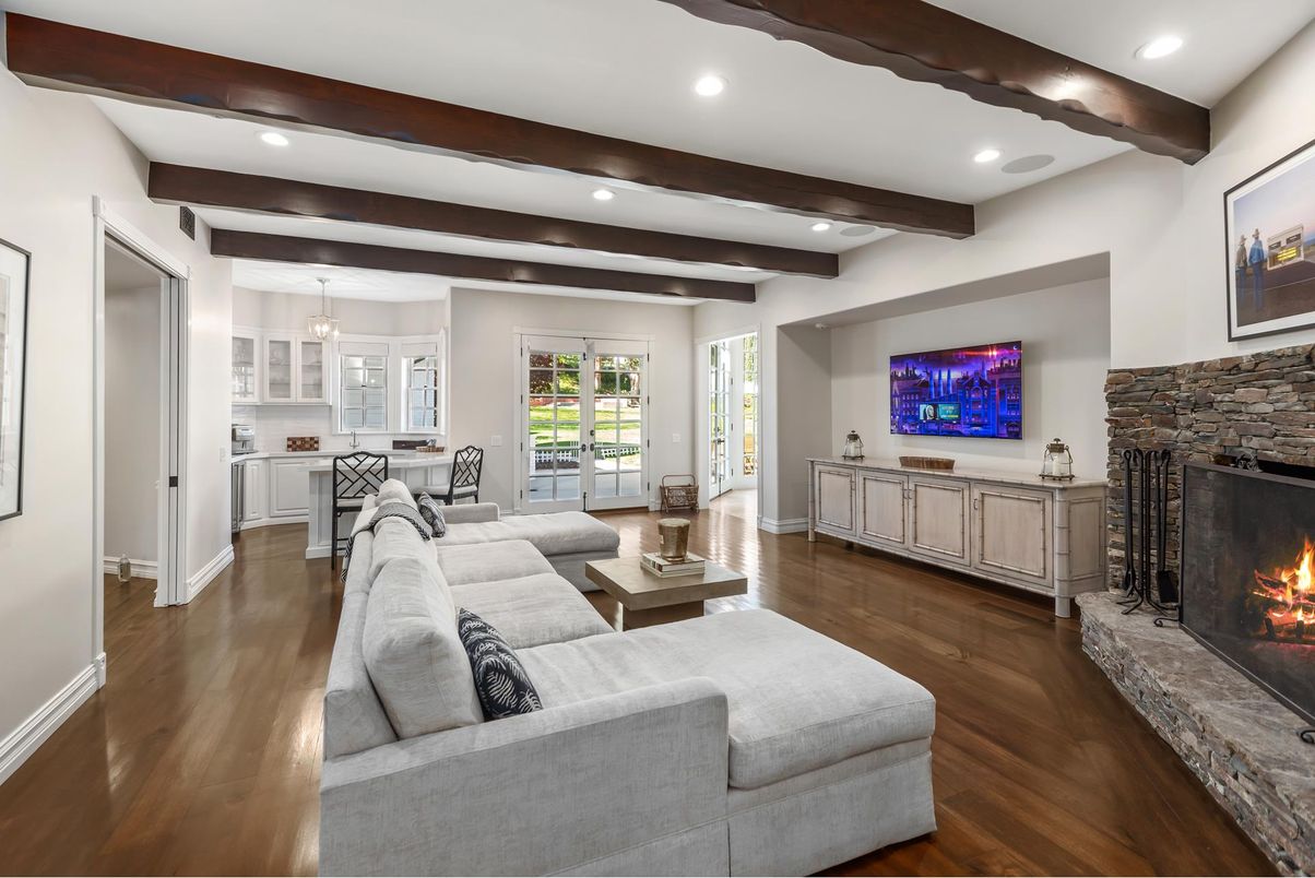 Dining room, Fireplace, Interior, Living room, Pendant Lights, Recessed Lighting, Wooden Beams, Wood Texture Flooring