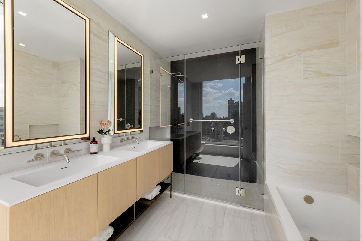 Bathroom, Dual Sink Vanities, Glass Shower, Interior, Marble, Marble Walls, Recessed Lighting, Wood Texture Flooring
