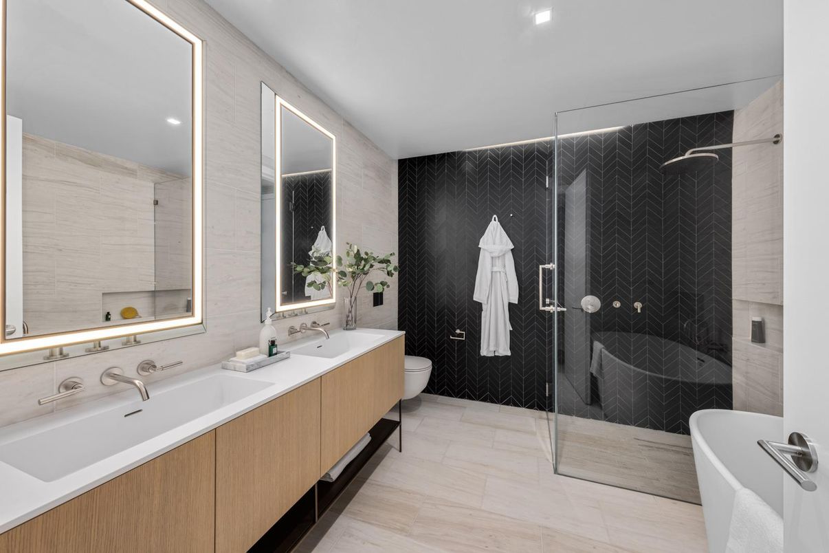 Bathroom, Dual Sink Vanities, Free Standing Baths, Glass Shower, Interior, Marble Walls, Recessed Lighting