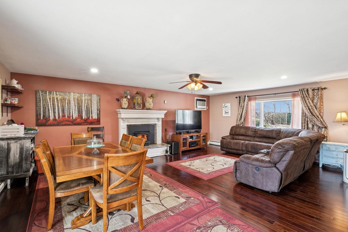 Dining room, Fireplace, Interior, Living room, Recessed Lighting, Wood Texture Flooring