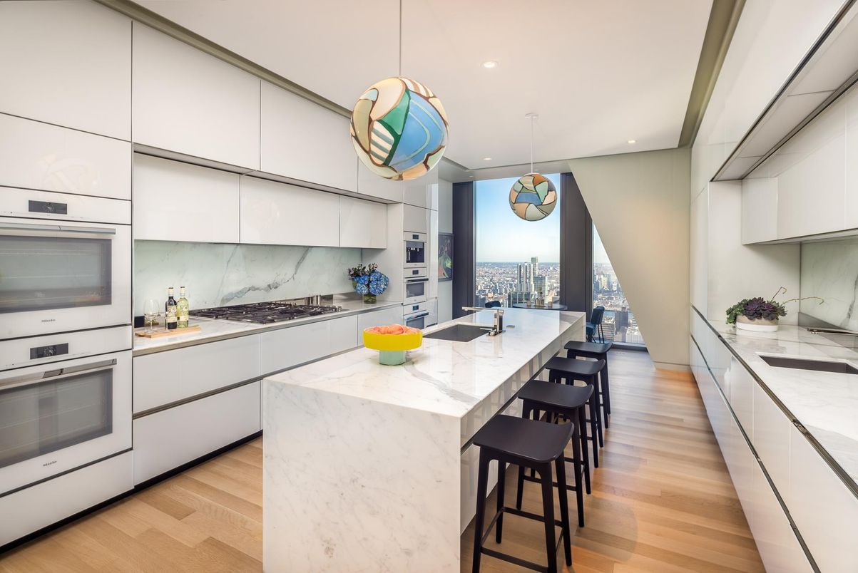 Interior, Kitchen, Marble Walls, Pendant Lights, Recessed Lighting, Stainless Steel Appliances, Wood Texture Flooring