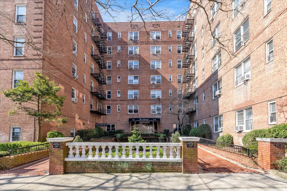 Exterior, Facade, Brick Facade, Condo Building