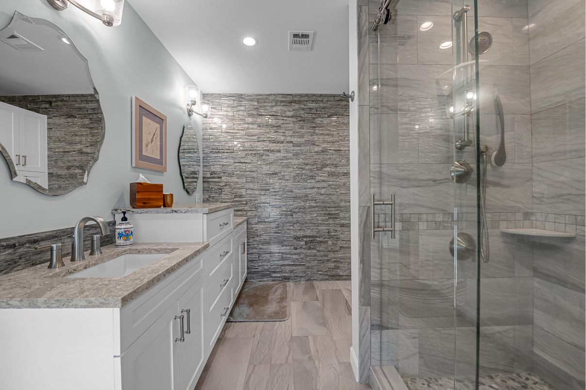 Bathroom, Dual Sink Vanities, Glass Shower, Interior, Recessed Lighting, Wood Texture Flooring