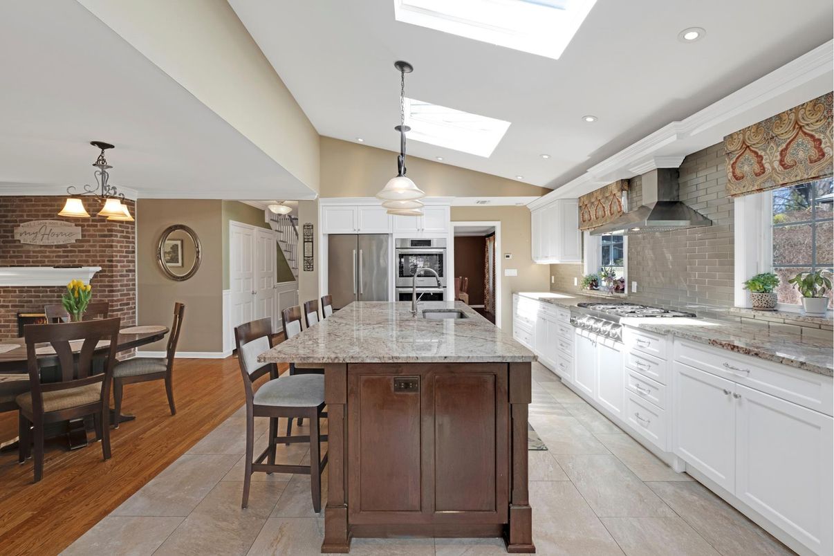 Dining room, Interior, Kitchen, Pendant Lights, Recessed Lighting, Stainless Steel Appliances, Stone Walls, Wood Texture Flooring