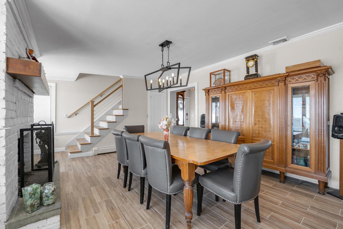 Dining room, Fireplace, Interior, Pendant Lights, Wood Texture Flooring