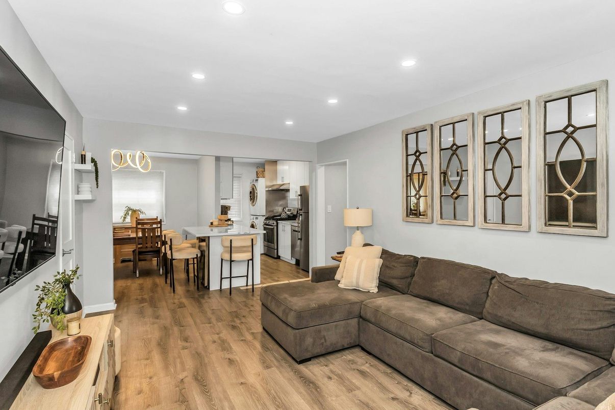 Dining room, Interior, Kitchen, Living room, Recessed Lighting, Stainless Steel Appliances, Wood Texture Flooring