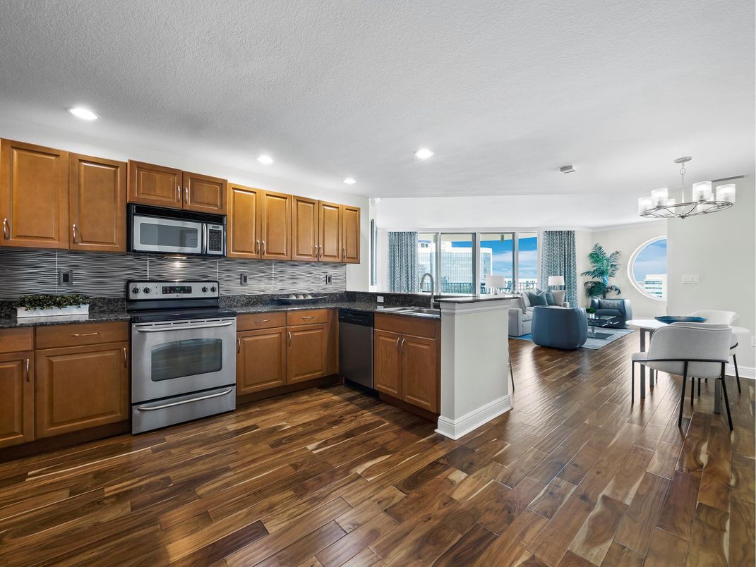 Chandelier, Dining room, Interior, Kitchen, Living room, Recessed Lighting, Stainless Steel Appliances, Wood Texture Flooring