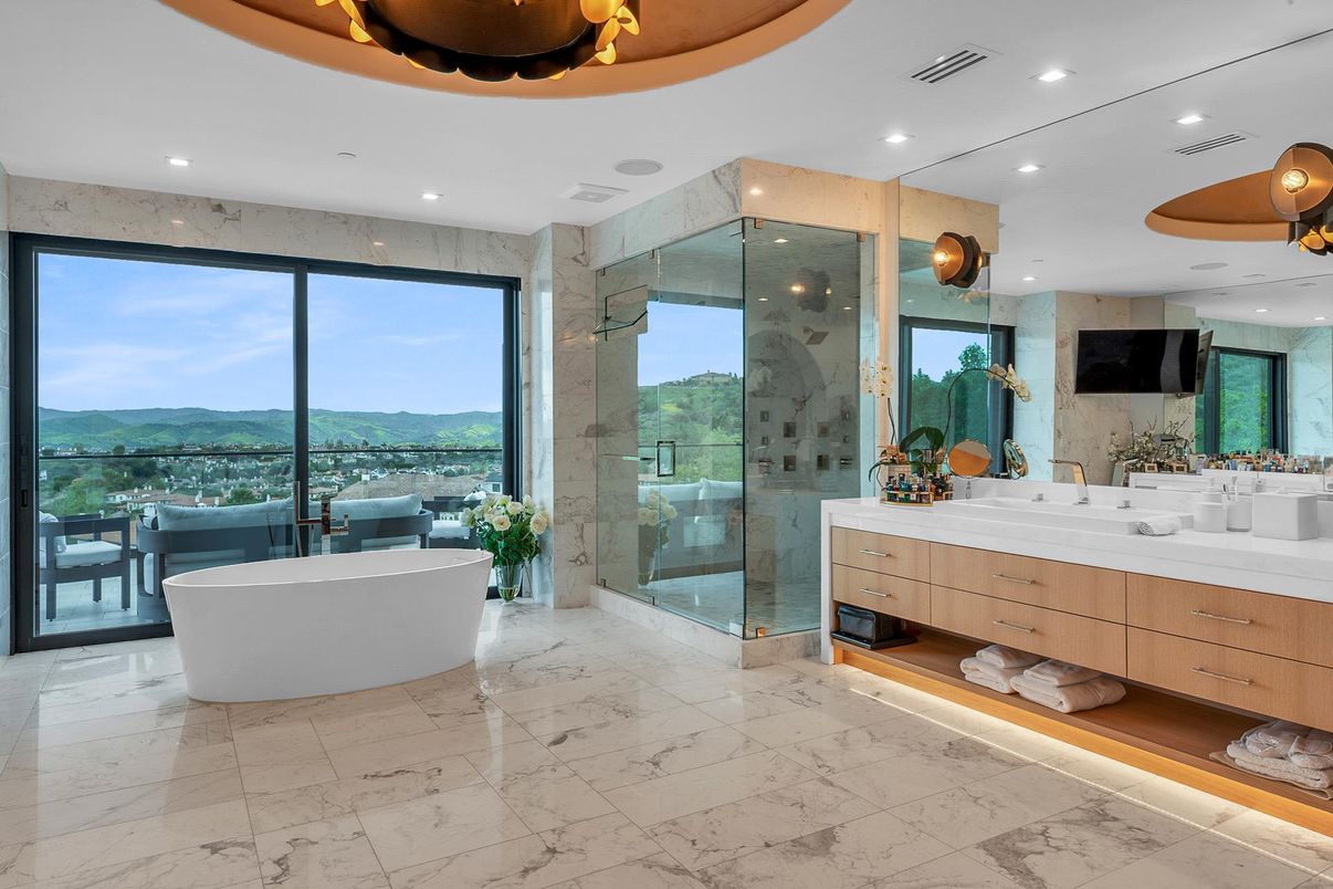 Bathroom, Dual Sink Vanities, Free Standing Baths, Glass Shower, Interior, Marble, Marble Walls, Recessed Lighting