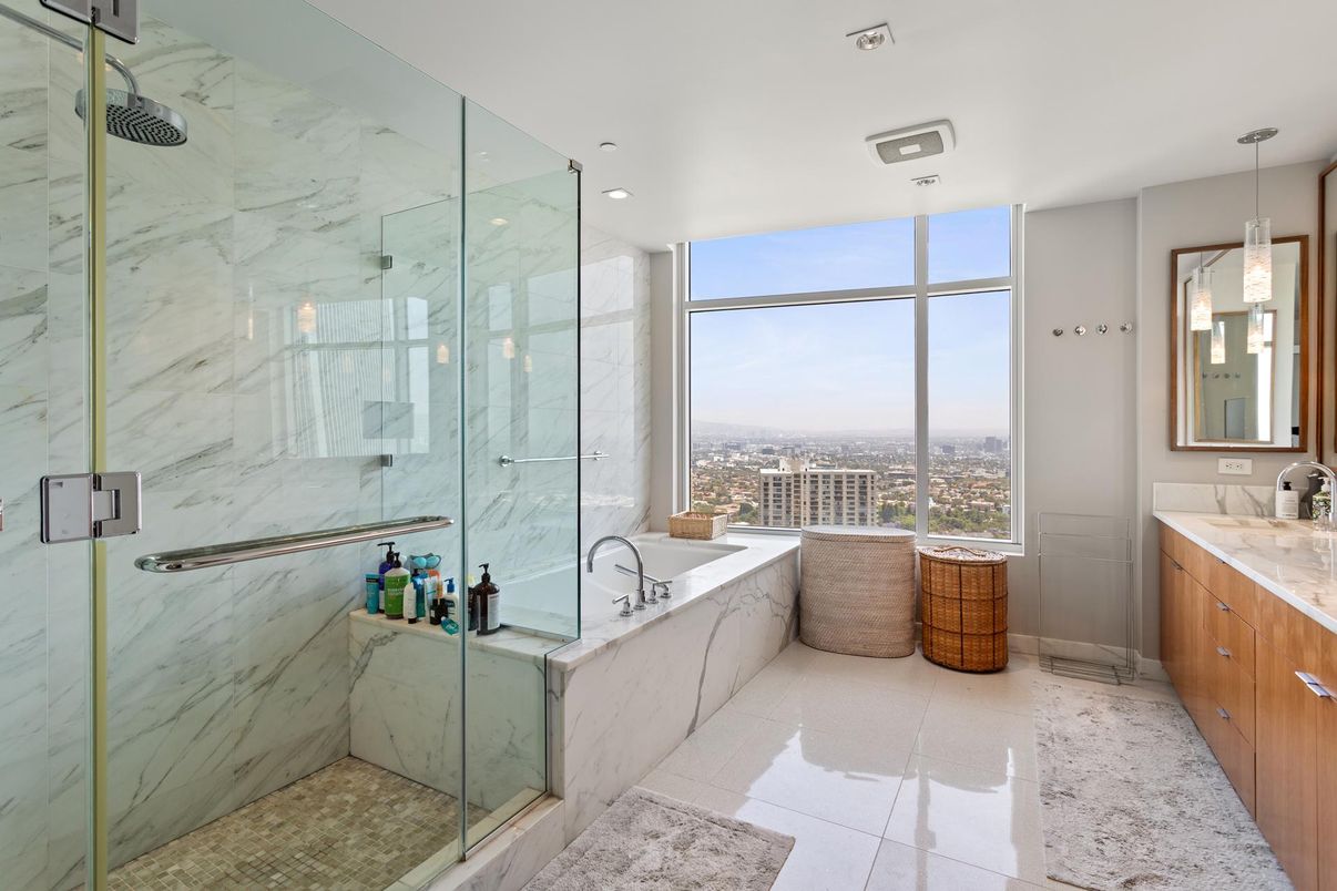 Bathroom, Dual Sink Vanities, Glass Shower, Interior, Marble Walls, Pendant Lights, Recessed Lighting