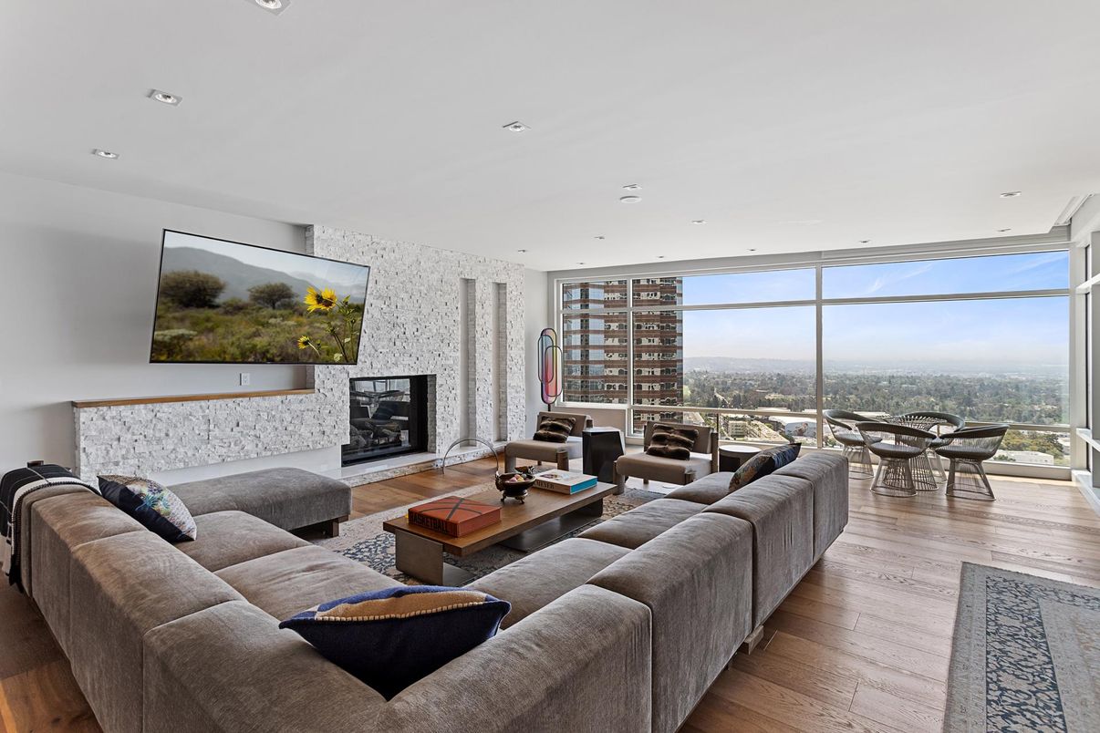 Fireplace, Interior, Living room, Recessed Lighting, Stone Walls, Wood Texture Flooring