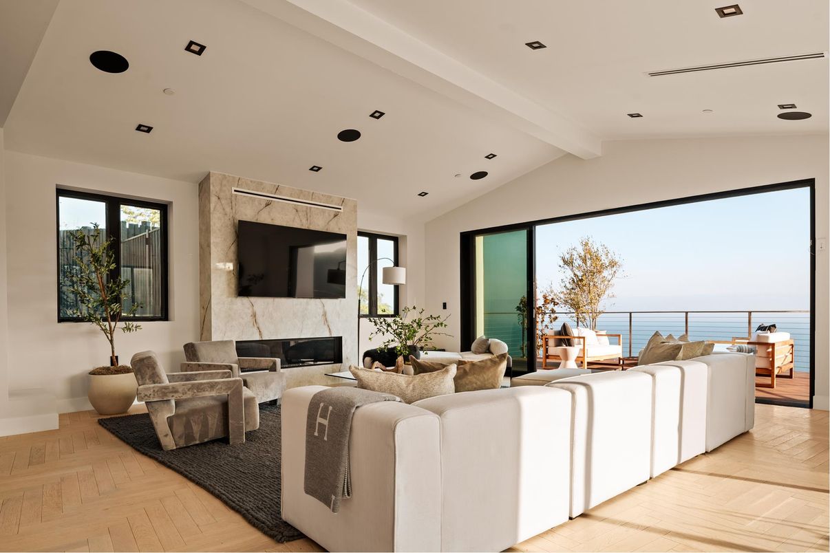 Fireplace, Interior, Living room, Recessed Lighting, Water, Wood Texture Flooring