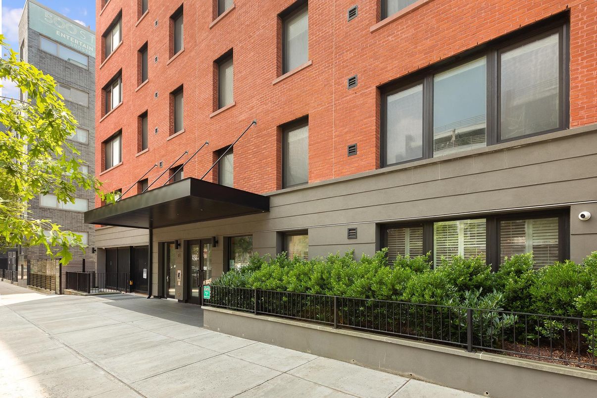 Exterior, Facade, Brick Facade, Condo Building